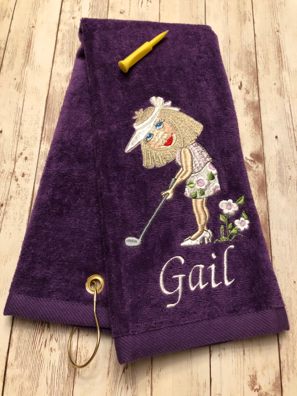 embroidered towel for Gail with image of a female golfer